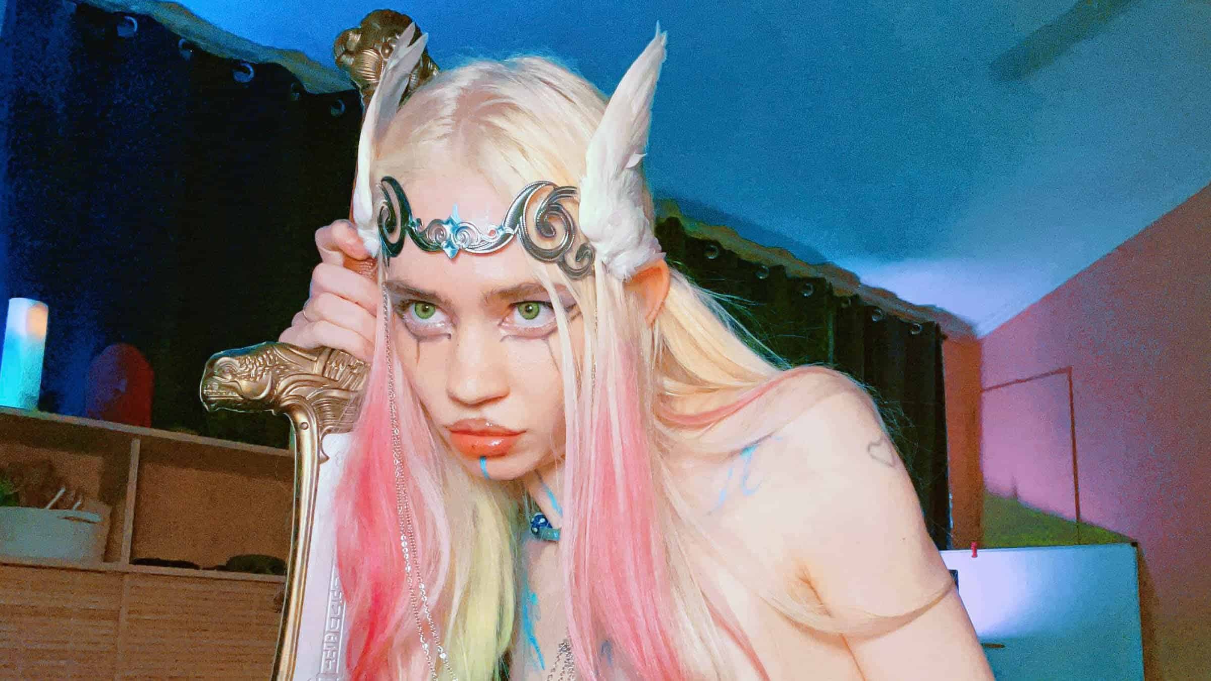 Grimes might have finally got those elf ears after finishing album at ...